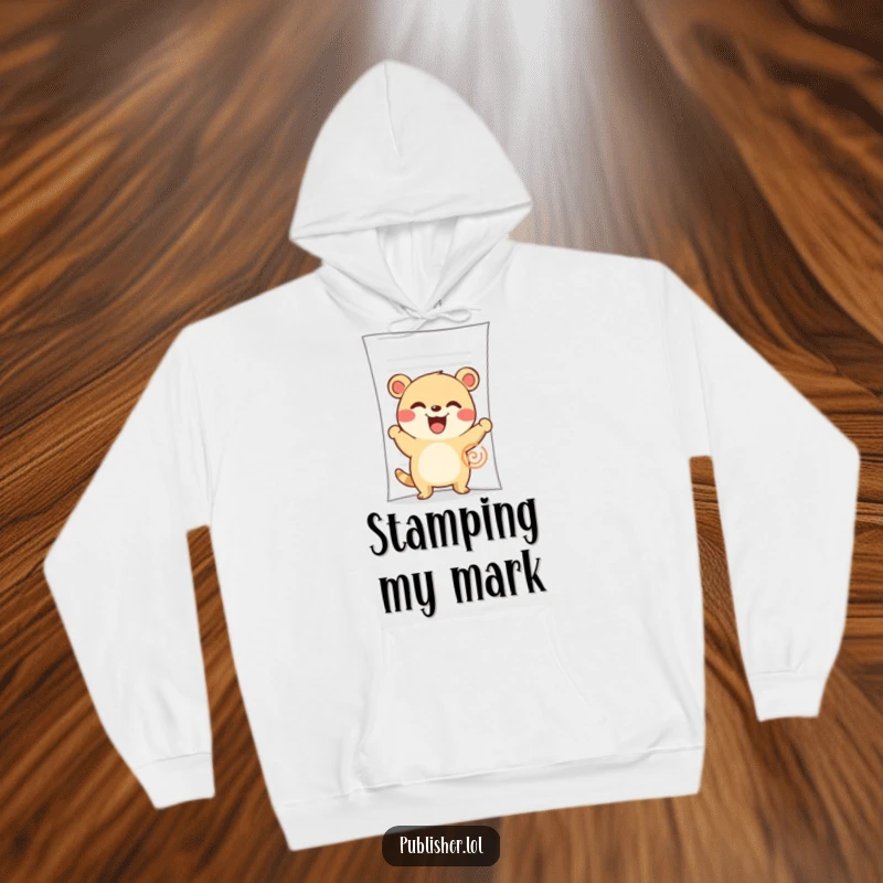 Funny Hoodie: A cute, grinning animal character enthusiastically stamps a large document, symbolizing approval.